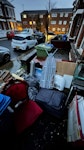 Mix of junk as per photos Mix of items including an ironing table, red chair, luggage, cardboard box, small furniture, ventilator, piece of wood, an old sink and a couple of bags. This excludes the trolley. SE15 - removed for £110