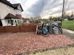 Lawnmower, ladde, boxes, bags. Mixed bulky waste for collection:
 • ~5–6 large rubble/garden waste bags
 • 2 rolled carpets/underlay
 • 1 push lawnmower
 • 1 ladder
 • A few wooden planks/offcuts
 • Some frames and a couple of plastic panels/box parts
 • 1 small tub/bucket B32 - removed for £104