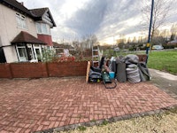 Lawnmower, ladde, boxes, bags. collected by Achut Ltd