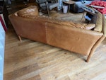 Leather sofa John Lewis Sofa W 190cm H 64cm D 89cm
Reasonable condition although with a splattering of black drop stains W12 - removed for £91