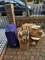 carboard, a suitcase collected by S.B Waste Removals
