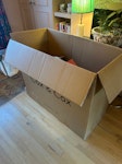 Cardboard boxes and glass fram Two large furniture cardboard boxes with polystyrene and wrapping etc inside. One large secondary glazing pane. TW1 - removed for £57