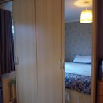 double wardrobe and 6 draw che large doublewardrobe with shelves and chest
of drawers OL10 - removed for £130