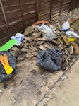 Rubble and some garden waste Some building rouble some garden waste 
Left over carpet some old flooring plastic CR2 - removed for £214