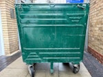 Galvanised steel wheelie bin Can be sold for scrap or recycled/repurposed/refurbished. All wheels in good working order. Measures: W115xH132xD94cm. Volume: 450kg. Unlidded but potential for a replacement to be sourced and fitted. N1 - removed for £13