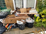 builders waste front garden full of builders waste from bathroom refit. PLEASE LOOK AT IMAGES CAREFULLY!!!!! SE6 - removed for £343
