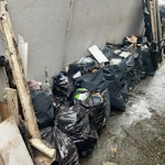 Wood, tiles, various Old kitchen cabinets, building waste, bathroom tiles, general waste to the alleyway- please also quote to collect bags to overflowing bins to front as bin collection dont seem to collect. CR7 - removed for £471