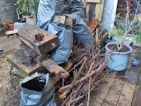 Wooden sleepers, garden waste collected by MrTrashLondon