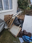 house waste 1 mattress wood old bed kitchen unit worktop old doors old metel shed some bags of rubbish HA8 - removed for £221