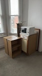 cupboards, microwave, iron brd 2x shelves, 1x cupboard, 2x ironing board, lamp stand, 3x picture frames, wooden boards SW6 - removed for £86