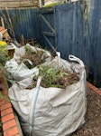 2 skip bags of garden waste 2 skip bags as shown (~75cm per side) of garden trimmings: branches, leaves, dead plants, weeds. Will need to go out the garden gate as shown in picture. Garden gate is over 80cm wide, but contents of the bags are making them bulge out (as shown).

Pickup on Sunday ideally  3-4pm or after 530pm should be ok too. Do confirm availability. E11 - removed for £117