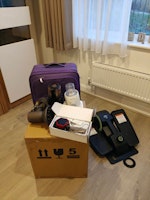 Luggage and item to dispose of collected by doos removals