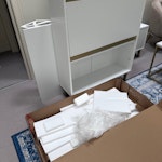 broken cabinet and packaging 1 broken shoe cabinet, 1 door from shoe cabinet, large box of packaging SW6 - removed for £65