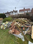 Fence wood, bags rubble Fence wood slats, bags rubble, concrete from fence posts CH62 - removed for £313