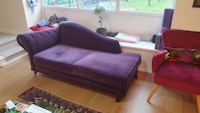 Purple ottoman couch collected by Ican Services