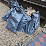 Approx 15 bags of wood Parts from rotten garden fence panels & posts that needed replacing. I have COPD & cannot lift or carry anything heavy & the council will not take KT6 - removed for £111