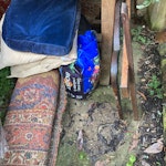 Mixed waste Wood, domestic waste, metal, heavy laminate worktop (still in wrap), rug, mirror, small soil bags, coat hangers (everything on and under garden table - not the table!) TW8 - removed for £130