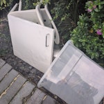 2 chairs, sm door, storage box two unusable plastic chairs, kitchen cabinet door, broken plastic storage box N8 - removed for £36