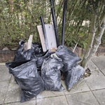 9 rubble sack, cast iron pipe 9 rubble sacks with t Bible a, sand and cement, some old wood/plastic pipes and a cast iron pipe NW2 - removed for £59