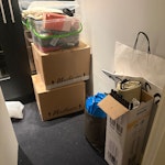 cardboard, elctronics, shelf 2 Empty cardboard boxes, a wire shelving unit, some electronics and hand towels W8 - removed for £214