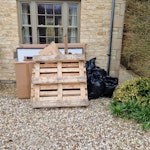 Wooden pallet & other rubbish Wooden pallet, cardboard boxes, trash bags, and other solar install rubbish GL54 - removed for £88