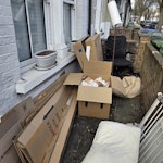 Lots of boxes and bags + chair Lots of materials coming out of a home move SE10 - removed for £86