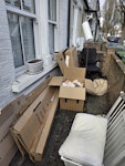 Lots of boxes and bags + chair Lots of materials coming out of a home move SE10 - removed for £86