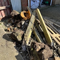 Rubble and concrete posts collected by AJD man and van