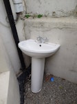 Bathroom sink/pedestal unit Broken bathroom sink and pedestal unit, with taps still attached but all other plumbing/pipework removed N7 - removed for £57