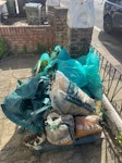 builders and garden waste About 5 bags of builders waste/render
About 6 bags of garden waste 
Old fence panelling and some small logs
Bike wheel
A crate SW2 - removed for £86