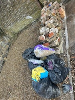 rubble, bricks, bags of rubble collected by Wasted