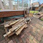 Wooden jungle gym with slide Dismantled wooden jungle gym, slide and metal pole, already cut into pieces 1 person can carry. Stacked in back garden, but easy access through side passage to right of garage on good concrete path KT10 - removed for £200