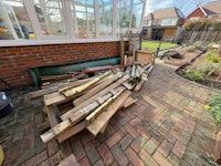 Wooden jungle gym with slide collected by Waste Collective