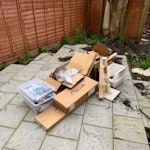 boxes and cat stuff mainly cardboard boxes, some have bits of styrofoam in but not much. also a couple bits of general rubbish and old (and emptied) cat litter tray and tower SE26 - removed for £43