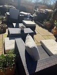 garden furniture and bin bags garden furniture set one sofa 2 chairs and 2 ottomans and cushions around 5 bin bags tree skirt runner rug wooden steps and 2 boxes of old wine glass and an empty tin EN9 - removed for £130