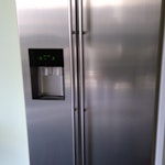 American style fridge freezer Obsolete American fridge freezer which needs to be collected, doors have been removed in order to store in garage. S10 - removed for £130