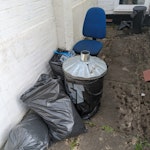Bags of junk, and office chair I've got five black bags full of assorted household items (rusted, broken) that the previous owner buried in the garden, an office chair, and a metal bin incinerator (in a bag) that I'd like picked up. None are super heavy, nor full. I can pop them all outside of my house ready to go. HP1 - removed for £91