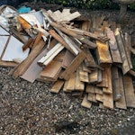 wood and metal water tank metal water tank cut up in the black bags- insulation- wood and timber as shown a small pile of used bricks - same waste different angles as in photo. IP33 - removed for £228