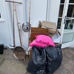 Boxes, metal rail, bags of MDF Two large cardboard boxes, 2 bags of MDF offcuts, disassembled metal/copper clothes rail (metal can be sold on so this should be reflected in your quote), 2 cushions, small MDF shelf TW1 - removed for £45