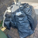 Plasterboard -14 rubble sacks In front garden by pavement. Waste from demolished shed office. TW11 - removed for £82