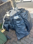 Plasterboard -14 rubble sacks In front garden by pavement. Waste from demolished shed office. TW11 - removed for £82