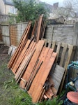 Garden shed and building waste timbers (with nails) from demolished garden shed, sheets of plasterboard, roll of linoleum, few pieces of solid insulation, tiles, DIY rubble/plaster, general DIY waste and a lawn mower SW17 - removed for £277