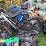 Clearance moving after 10 year Moving home after 10 years, shed clearance, broken bicycles, bags of old blankets, broken garden pots and light stakes, around 8 black bags of rubbish, broken ironing board, two small side tables with basket drawers, 3 small coffee tables, broken coffee machine, old toys, old cushions and two broken drawers, two broken xboxes TW2 - removed for £214