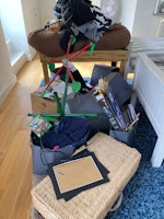 Old clothes, kids pool table collected by T's Waste Removal