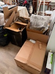 cardboard and household waste cardboard boxes, a small amount of household waste, one old duvet and a standard lamp in working order SK11 - removed for £104