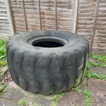350 Kg tyre Remove and dispose of 350kg tyre from back garden CR0 - removed for £257