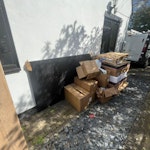 Solar install waste. Solar panel, wooden pallet, and cardboard boxes. HP14 - removed for £94