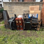 Household and backyard waste Some electrical items - broken toaster and speakers. A metal barbeque and chiminea. The rest is mostly wooden. All easily accessible at the back of the property. There is a stone on the floor next to the chiminea - please leave it there, it covers the external stop cock for the property. BL7 - removed for £117