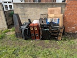 Household and backyard waste Some electrical items - broken toaster and speakers. A metal barbeque and chiminea. The rest is mostly wooden. All easily accessible at the back of the property. There is a stone on the floor next to the chiminea - please leave it there, it covers the external stop cock for the property. BL7 - removed for £117
