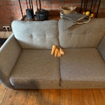Two seater sofa Two seater French Connection charcoal sofa, overall in good condition minus cat scratching on both arms. BR3 - removed for £78